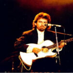 George Harrison playing guitar.
