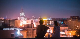 Couple looking into city
