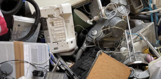 A variety of recycling waste, such as hoovers, toasters and plastics.