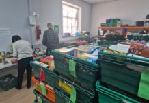 Volunteers helping at foodbank Captured by Natalya Luke