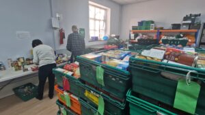 Volunteers helping at foodbank Captured by Natalya Luke