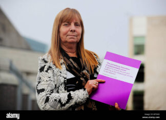 KFY648 KFY648 Margaret Aspinall holds a copy of Bishop James Jones' Hillsborough report, which has been published by the Home Office, after an event at Liverpool Metropolitan Cathedral.