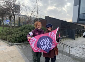 Two University teachers on the picket line (Image by Ella Williams)