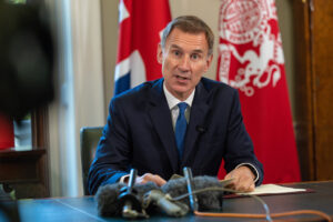 jeremy hunt sat at desk giving speech