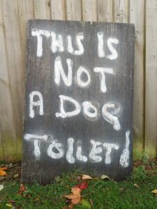 Sign saying this is not a dog toilet