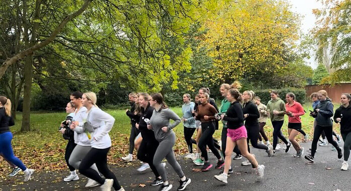 Women running in Sefton Park