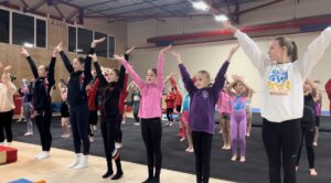 Aerial Gymnastics taking part in warm-up routine (c) Cassie Ward