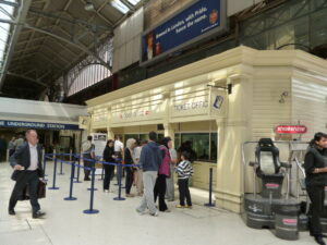 People queuing at ticket office (Creative commons licence)