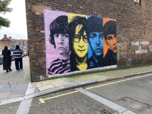 Iconic wall art of the four Beatles