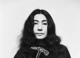 Yoko Ono with Glass Hammer (1967). Photograph Clay Perry (c) Yoko Ono