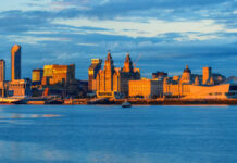 View over the Mersey River over to the Liverpool skyline. Credit Getty