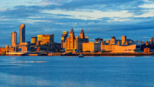 View over the Mersey River over to the Liverpool skyline.Credit Getty