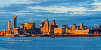 View over the Mersey River over to the Liverpool skyline. Credit Getty