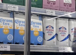 Non-alcholic and 0% beverages in a fridge at CO-OP waiting to be sold.