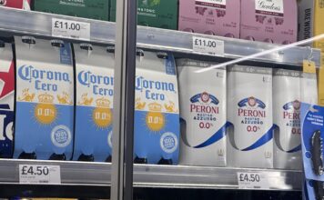 Non-alcholic and 0% beverages in a fridge at CO-OP waiting to be sold.