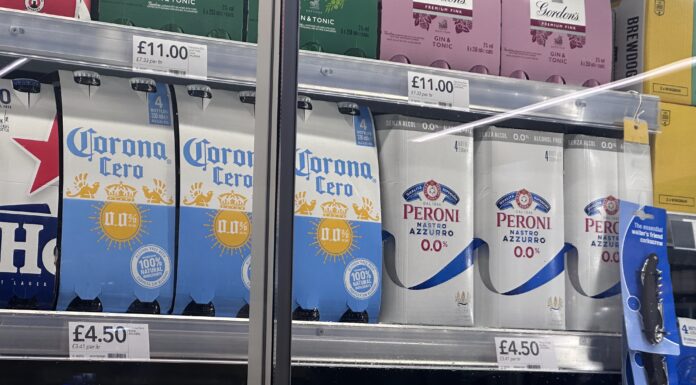 Non-alcholic and 0% beverages in a fridge at CO-OP waiting to be sold.