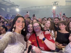 Dua Lipa takes a selfie with fans at Anfield Stadium (c) Kayla Leech 
