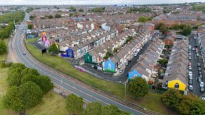Wide, high, drone shot of Flower Streets murals in Kirkdale.