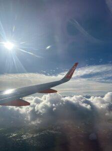 Plane wing in the sky