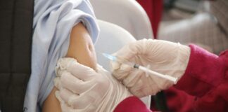 A patient receives a vaccine