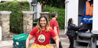 Image of FoodCycle volunteer helping (c) Deb James, FoodCycle