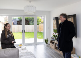 Mayor Steve Rotheram visiting one of the new houses.