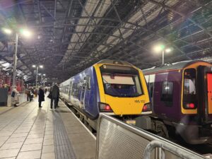 Image shows train stationary at Liverpool Lime Street train station