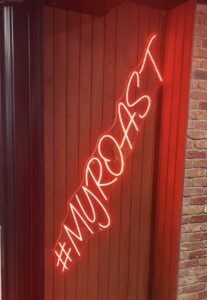 A picture of the sign outside Roast