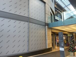 Exterior of the Cricket shop 'closing down' wall. Anasimone Ibrahim