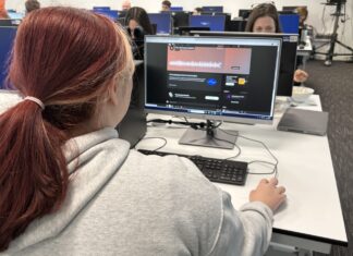 Chloe on computer. Photo (c) Hannah O'Sullivan