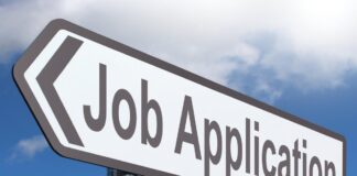 A road sign of a job application.