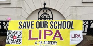 save LIPA poster outside the school