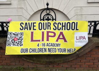 save LIPA poster outside the school