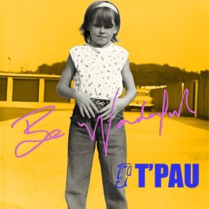 Album cover for T'Pau's 2026 album, 'Be Wonderful'. A black and white photo of a young girl appears centrally on an all yellow background.