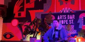 Musician Charlie Smith performing at Arts Bar