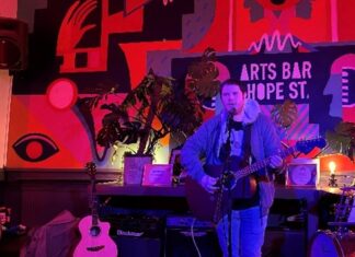 Musician Charlie Smith performing at Arts Bar