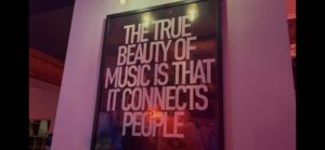 A poster at Arts Bar about music