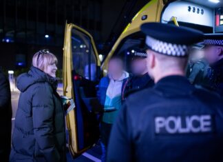 Over 1000 arrests in fight against ‘county lines’ drugs gangs Man being arrested in front of police van